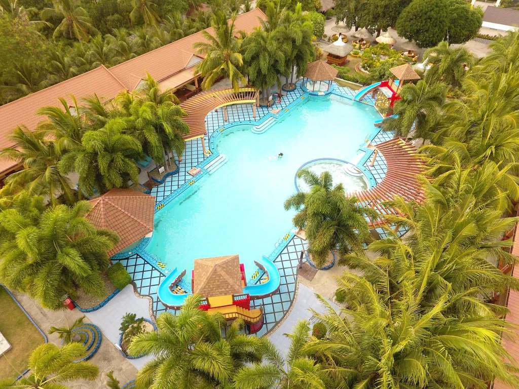 Hero photo — wide exterior or beachfront shot